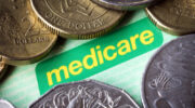 Australian Medicare card and money.