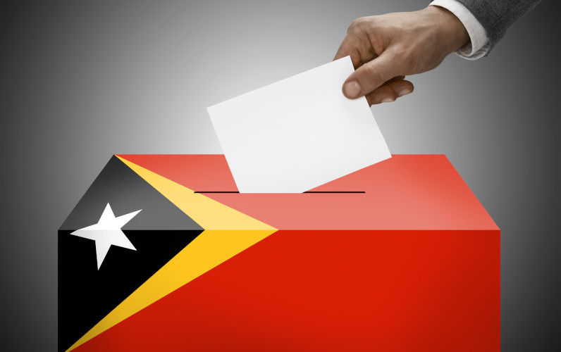 Ballot box painted into national flag colours - East Timor.