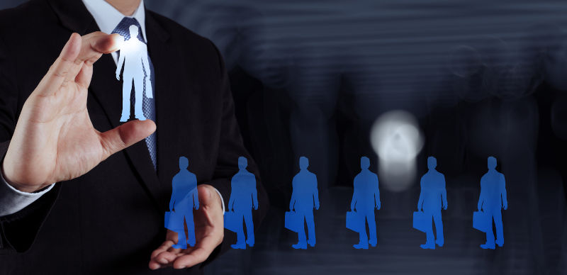 Hand choosing people icon as human resources concept.