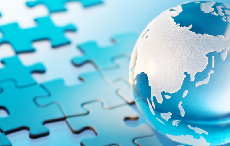 Glass globe and unfinished puzzle.