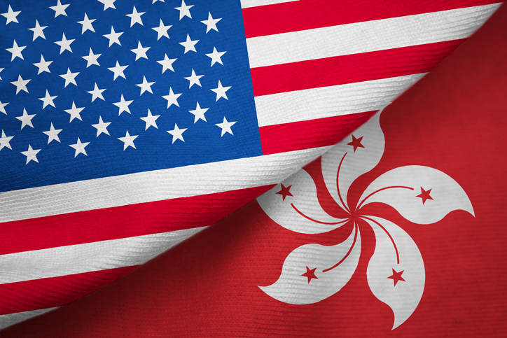 USA flag folded diagonally over the Hong Kong flag Image:iStock