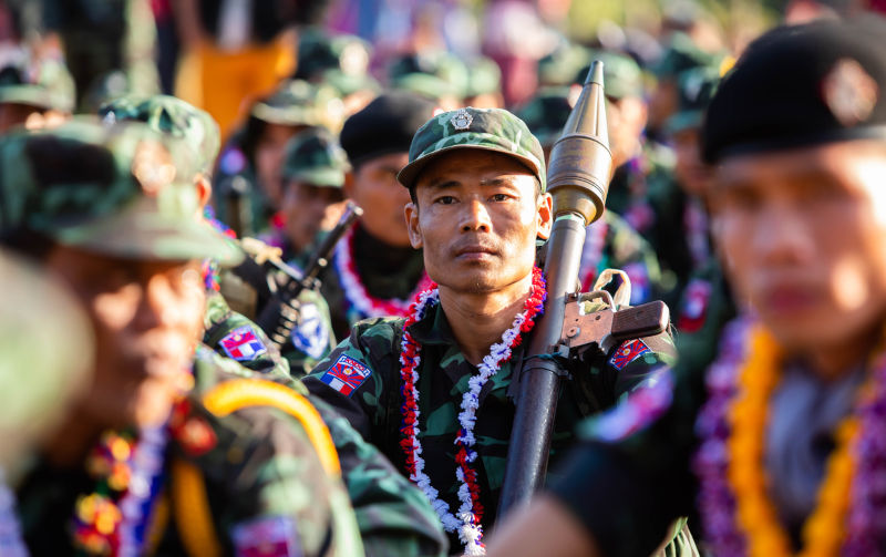 Hpa An, Myanmar - : Unidentified Karen military sitting with weapon RPG.