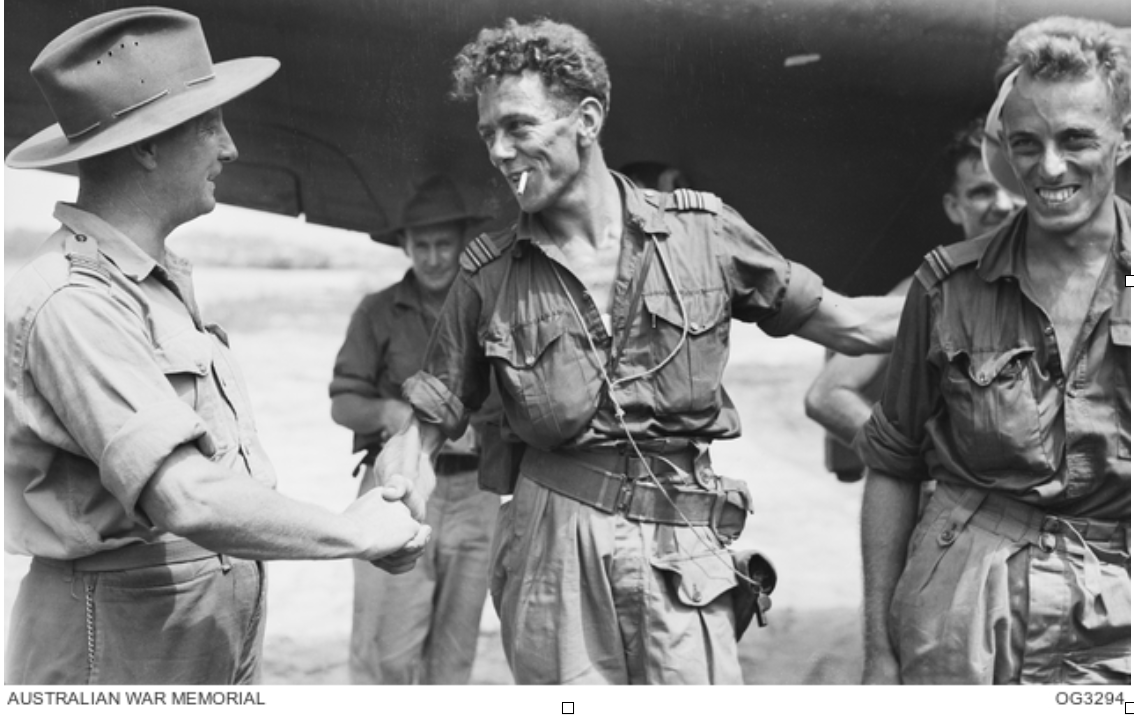 FLT. LT. ERIC W. ROBINSON, (LEFT), WELCOMES FLT. LT, VERNON J. SIMS, (CENTRE), AND HIS NAVIGATOR, FLYING OFFICER REGINALD FARRAN The forgotten war heroes of Borneo