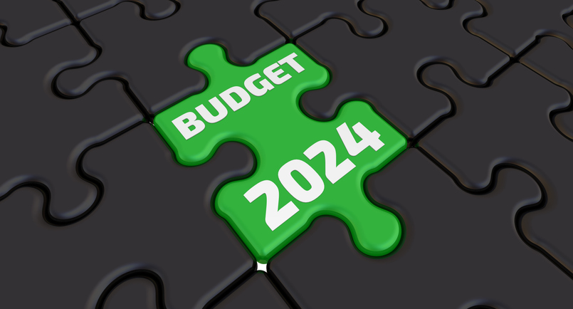 The budget of 2024. Folded black puzzles elements and one green with white text BUDGET 2024. 3D illustration. Image: iStock/Waldemarus