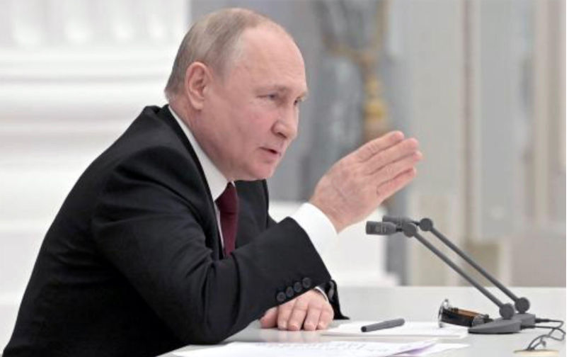 VLADIMIR PUTIN, Russian President,defends his attack on Ukraine,in a televised speech on 24 February 2022. Photo: Kremlin TV Contributor: Pictorial Press Ltd / Alamy Stock Photo Image ID: 2HTD2RR