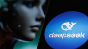 Hong Kong, China. 25th Feb, 2025. In this photo illustration, Artificial intelligence (AI) apps of DeepSeek is seen on a smartphone screen in front of the background of a AI generated humanoid image. Credit: SOPA Images Limited/Alamy Live News Contributor: SOPA Images Limited / Alamy Stock Photo Image ID: 2SXK3PW
