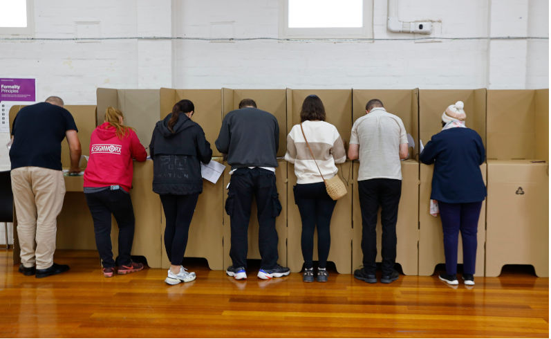 Voters seen casting their ballots at a polling centre during early voting for the 2025 Australian federal election. Werribee Masonic Hall serves as an early voting centre in the Division of Lalor, a safe Labor seat currently held by MP Joanne Ryan. Early voting has started ahead of the election scheduled for 3 May. Werribee, is experiencing rapid population growth and ongoing infrastructure, housing and transport issues central topics in the 2025 campaign. Liberal Party candidate Mira D'Silva is contesting the seat aiming to challenge Labor's long-standing dominance in the area. (Photo by Ye M. Contributor: Sipa USA / Alamy Stock Photo Image ID: 3AXYHBB