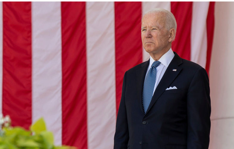 Arlington, United States Of America. 31st May, 2021. U.S President Joe Biden stands at attention during the annual Memorial Day commemoration in the Memorial Amphitheater at Arlington National Cemetery May 31, 2021 Arlington, Virginia. Credit: Planetpix/Alamy Live News Contributor: US Army Photo / Alamy Stock Photo Image ID: 2G04PRE