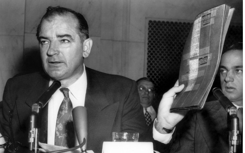 WASHINGTON: Sen. Joseph R. McCarthy (R. Wisc) holds up a copy of the Army's charges against him as he interrogates Army. Contributor: Everett Collection Historical / Alamy Stock Photo Image ID: CWA7P0