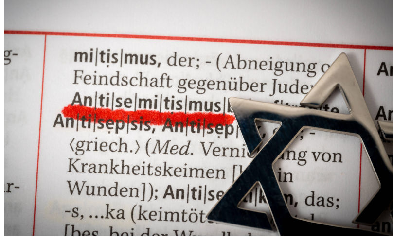 Augsburg, Bavaria, Germany - November 20, 2023: The word antisemitism in a dictionary next to a Star of David *** Das Wort Antisemitismus in einem Worterbuch neben einem Davidstern Credit: Imago/Alamy Live News Contributor: Imago / Alamy Stock Photo Image ID: 2T8EK1J