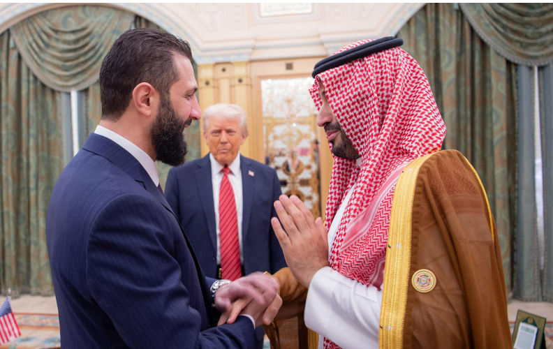 Riyadh, Saudi Arabia. 14th May, 2025. U.S. President Donald Trump, center, looks on as Saudi Crown Prince Mohammed bin Salman, right, shakes hands with Syrian Interim President Ahmed al-Sharaa, left, on Wednesday, May 14, 2025, in Riyadh, Saudi Arabia. Photo by Saudi Ministry of Foreign Affairs/UPI Credit: UPI/Alamy Live News. Contributor: UPI / Alamy Stock Photo Image ID: 3BB1E2D