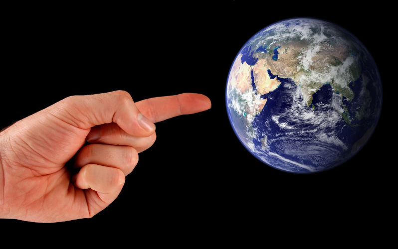 Pointing at Earth. Image: iStock / brandysites