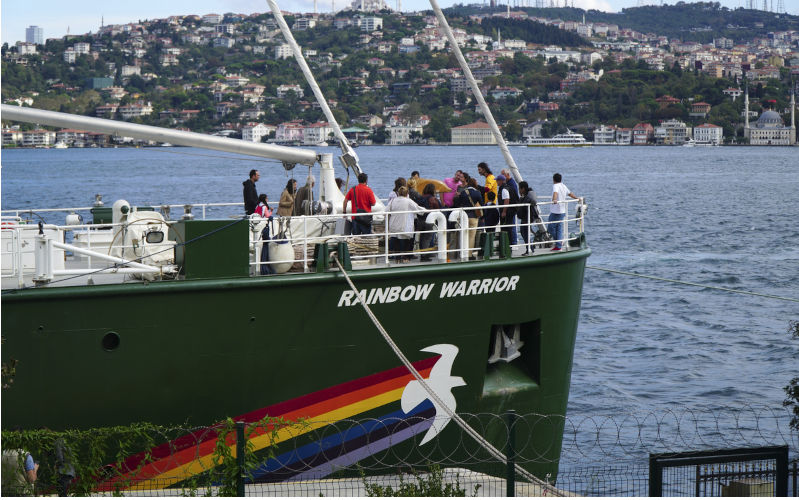 Greenpeace's Rainbow Warrior and People. Image:iStock/ESezer