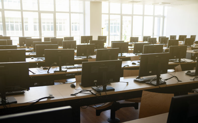 Classroom of many desktop computers. Image: iStock / Giulio Fornasar