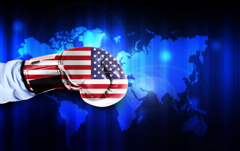 Hand in boxing glove with USA flag. Image: iStock / jeffy1139
