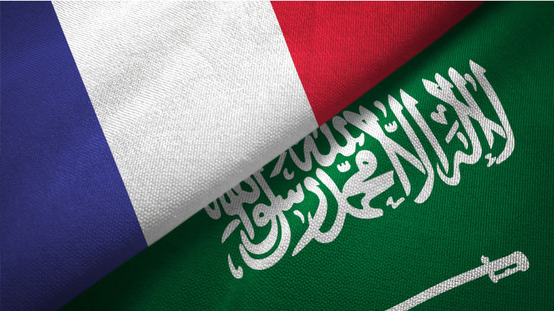 Saudi Arabia and France flag together relations textile cloth fabric texture. Image: iStock / Oleksii Liskonih