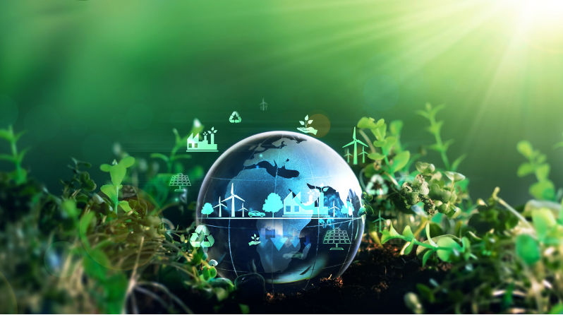 Green energy for clean and sustainable environment. Wind energy used in the industry of factories, machines and technologies. Reducing Co2 emissions and limiting global warming and climate change. Image: iStock / Galeanu Mihai