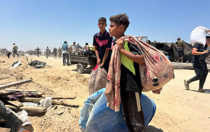 Palestinians inspect the damage to displaced people s tents after Israeli occupation forces withdrew from the slaughterhouse area in the centre of Khan Yunis, south of the Gaza Strip Palestinians inspect the damage to displaced people s tents after Israeli occupation forces withdrew from the slaughterhouse area in the center of Khan Yunis, south of the Gaza Strip, July 11, 2025. Photo by Moaz Abu Taha apaimages Khan Yunis Gaza Strip Palestinian Territory 110725_Khan_Yunis_MT_0013 Copyright xapaimagesxMoazxAbuxTahaxapaimagesx Image Alamy. ContributorImago. Image ID3BR8TAT