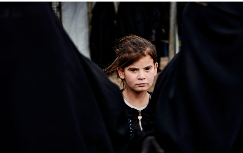 Al Hol Camp, February 11, 2025 A young girl in the market of Al Hol camp, where some 40,000 people accused of being affiliated with ISIS are detained. The presence of a large number of children in the camp poses a real concern about the future of these populations and their reintegration into society. 11/02/2025 Syria/? Al Hol ? Antonin Burat/Le Pictorium Credit LE PICTORIUM/Alamy Live News. ContributorLE PICTORIUM. Image ID3CNGF6P