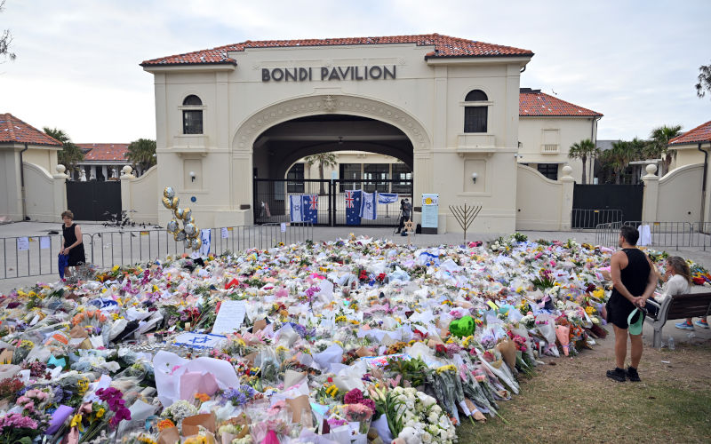 Flowers are seen at a makeshift memorial at the Bondi Pavillion following a shooting at Bondi Beach, in Sydney, Wednesday, December 17, 2025. Australia is in mourning after gunmen opened fire on Bondi Beach, killing 15 people in an attack designed to target the Jewish community. Image AAP Credit Mick Tsikas