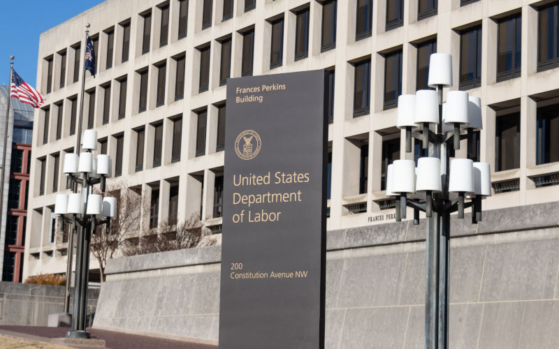 Sign on Constitution Avenue for the US Department of Labor HQ at the Frances Perkins Building in D.C. Image iStock Credit The Bold Bureau