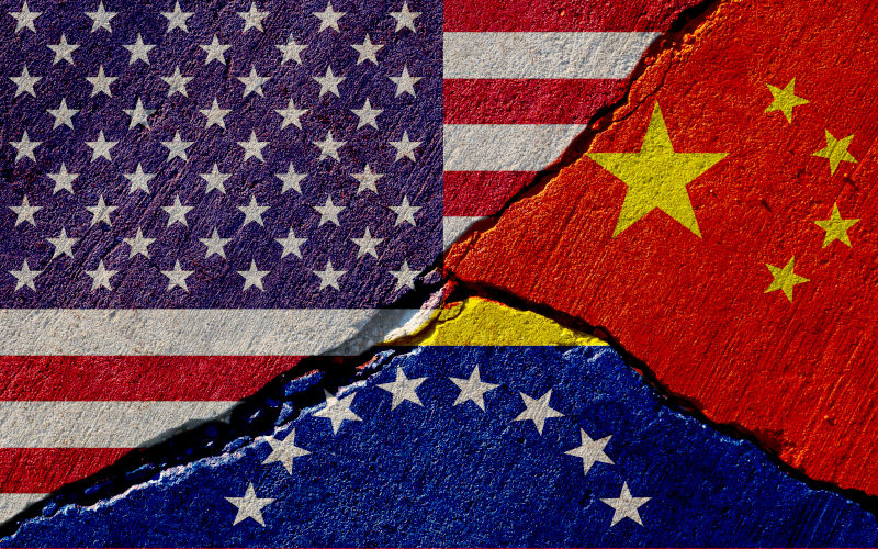 A concrete wall with painted United States, China and Venezuela flags Image iStock masterSergeant