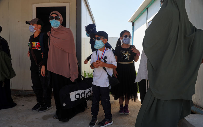 Members of Australian families at Roj Camp in eastern Syria, housing people with alleged ties to Islamic State militants, prepare to leave for Damascus as part of a second repatriation effort by Syrian authorities, at Roj Camp in eastern Syria, Friday, April 24, 2026. ImageAP Photo Baderkhan Ahmad