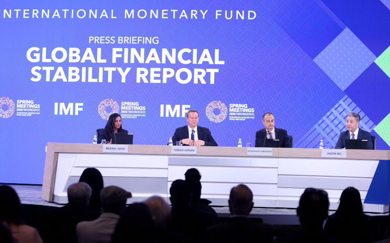 Washington Dc, Virginia, USA. 14th Apr, 2026. (L R) Meera Louis, communications officer at IMF, Tobias Adrian, director of monetary and capital markets at IMF, Athanasios Vamvakidis, deputy director of monetary and capital markets at IMF, and Jason Wu, assistant director of monetary and capital markets at IMF, attend a press conference during the Spring Meetings of the World Bank and the IMF in Washington, DC, USA, on April 14, 2026. The IMF said that assuming the conflict is shortlived, global economic growth will slow to 3.1 percent in 2026 (and 3.2 percent in 2027) and inflation will rise. Image Alamy. Credit Zuma Press Inc. Image ID 3E8GP04