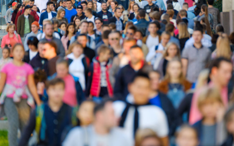 Crowd of people on the street. No recognizable faces. Image iStock toxawww