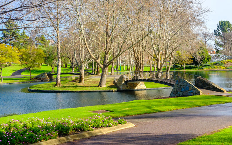 Rymill Park with bridges over the pond in Adelaide city on a sunny winter day. This place has been Adelaides families favourite since the 1960s Image iStock moisseyev