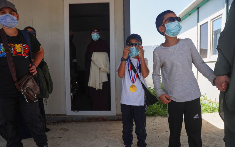 Members of Australian families at Roj Camp in eastern Syria, housing people with alleged ties to Islamic State militants, prepare to leave for Damascus as part of a second repatriation effort by Syrian authorities, Friday, April 24, 2026. AP Photo Baderkhan Ahmad