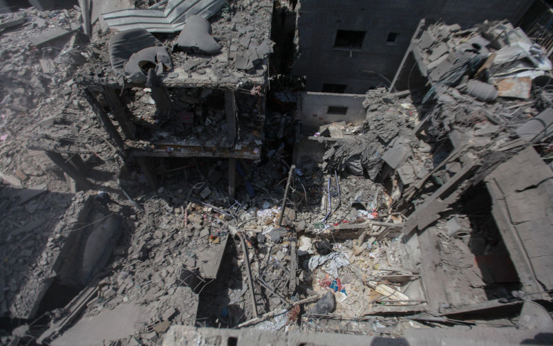 May 9, 2026, Palestine, Gaza (INT) Palestinians Inspect Damage After Air Strikes in AlShati Refugee Camp. May 9, 2026, Gaza, Palestine Palestinians inspect damage inside AlShati refugee camp (Beach Camp) following Israeli air strikes carried out during the early hours in western Gaza City. Residents were seen standing inside and around damaged buildings a day after the strikes, as debris and destruction remained visible across the area. Despite a ceasefire that has been in place since October last year, violence and air strikes continue across the Gaza Strip. ImageZUMA Press Inc. Alamy Image ID3EE6T8D