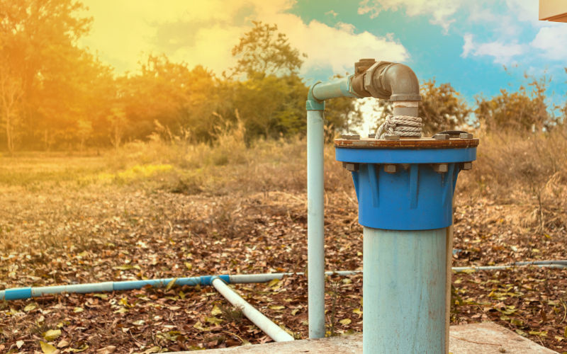 Groundwater wells are drilled and water is supplied with PVC pipes, groundwater pumping systems are powered by electricity to solve drought problems. Image iStock Sumeth Charee