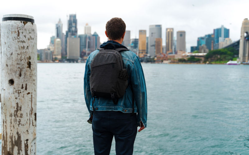 Man looking at Sydney cityscape Image iStock Julia Gomina