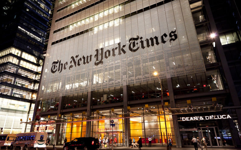 New York, NY, USA July 11, 2016 Headquarters of The New York Times in night. Image iStock mizoula