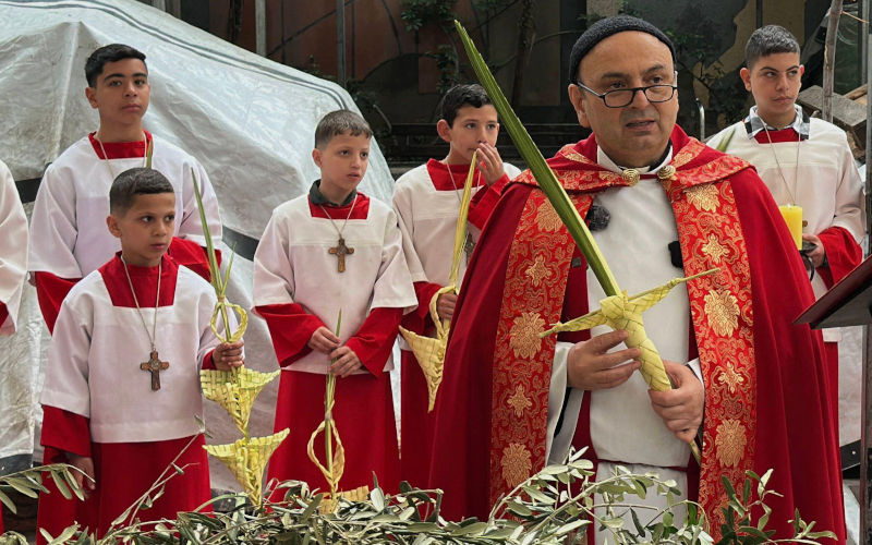 Christians attended Mass at the Church of the Holy Family in Gaza City on March 29, 2026, celebrating Palm Sunday, which commemorates Jesus triumphant entry into Jerusalem. Photo Mohammed al Aswad apaimages Alamy ID3E4RGK7