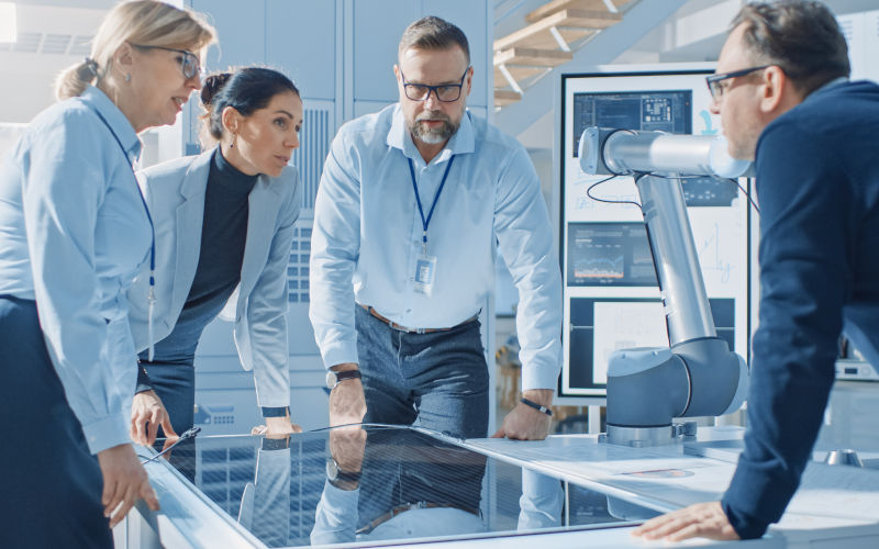 Renewable energy engineers working on an Innovative more efficient solar panel battery concept. ImageiStock gorodenkoff