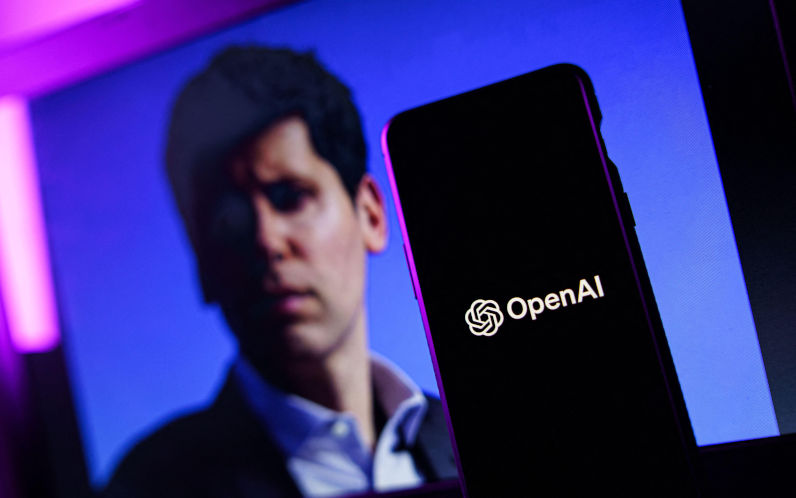OpenAI logo and Sam Altman in background on screen. Image Rokas Tenys. Alamy Image ID 2T8DPX6