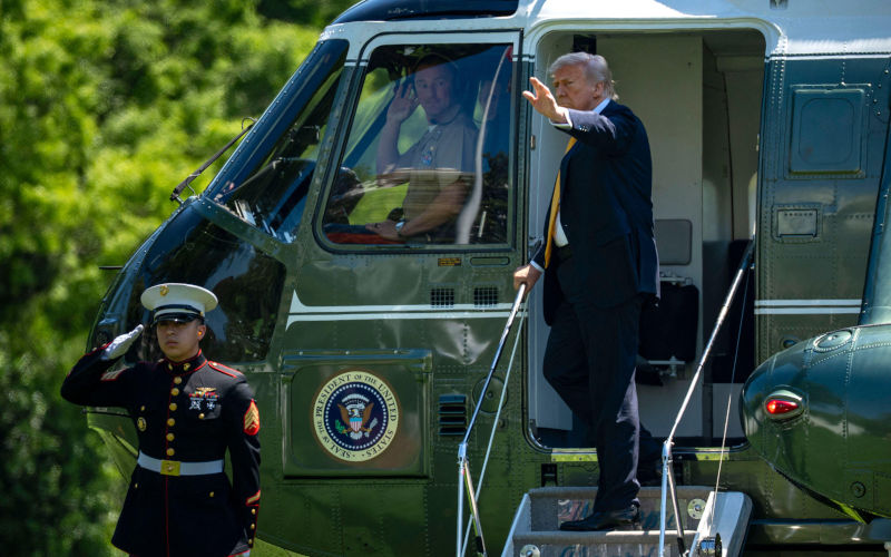 Washington, United States. 12th May, 2026. President Donald Trump boards Marine One on the South Lawn of the White House in Washington, DC for Beijing, China on Tuesday, May 12, 2026. Trump and Chinese President Xi Jinping are expected to discuss trade, artificial intelligence, export controls, Taiwan and the Iran war. Photo Abaca Press Bonnie Cash Pool Alamy Live News Image ID 3EEWGPR