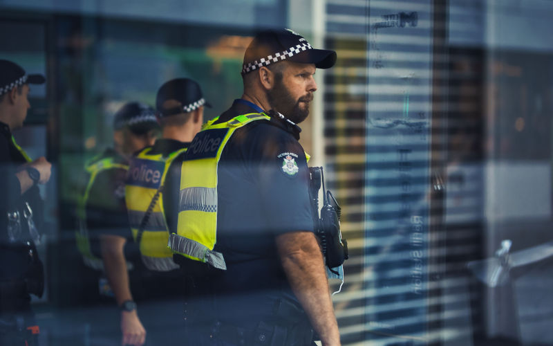 Melbourne, Australia A street photo of Victoria police, view through glass window. Image iStock Wirestock