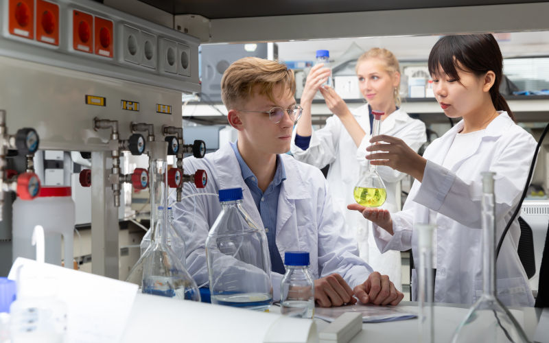 Research students engaged in research in a chemical lab. Image iStock JackF