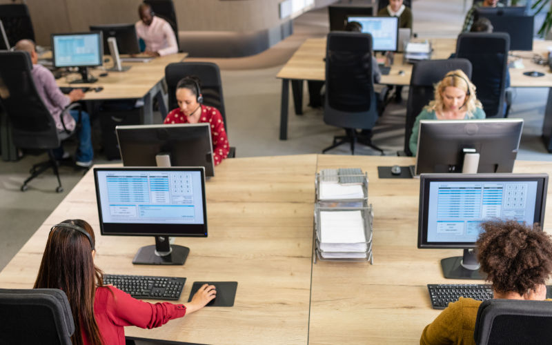 Call centre employees women and mixed ethnicity. Image iStock TashiDelek