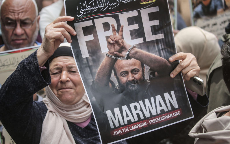 Nablus, Palestine. 19th Apr, 2026. A protester holds up a picture of imprisoned Fatah leader Marwan Barghouti during a demonstration march against a law passed by the Knesset that imposes the death penalty on Palestinians who kill Israeli civilians. Credit SOPA Images Limited Alamy Live News Alamy image ID 3E9R2T3