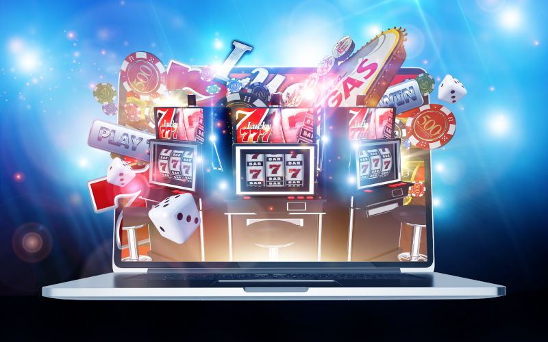 Online gambling and advertising bursting from a laptop screen . Image iStock Credit welcomia