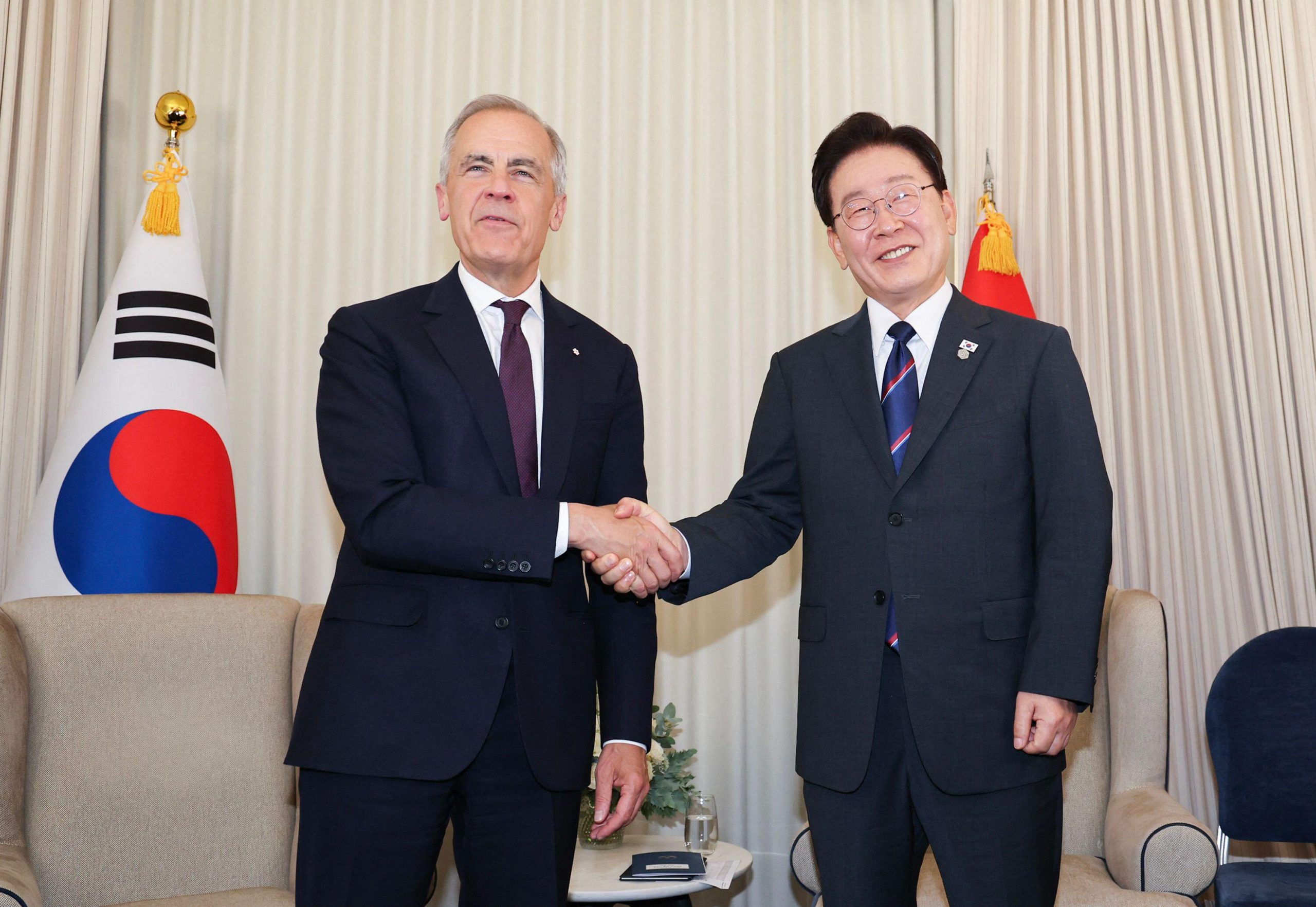 17th June, 2026. S. KoreaCanada talks South Korean President Lee Jae Myung (R) and Canadian Prime Minister Mark Carney pose for a photo prior to their talks in EvianlesBains, France, on June 16, 2026, on the sidelines of the Group of Seven summit. Image Yonhap Newcom Alamy Live News. Alamy image ID 3ER1AN4