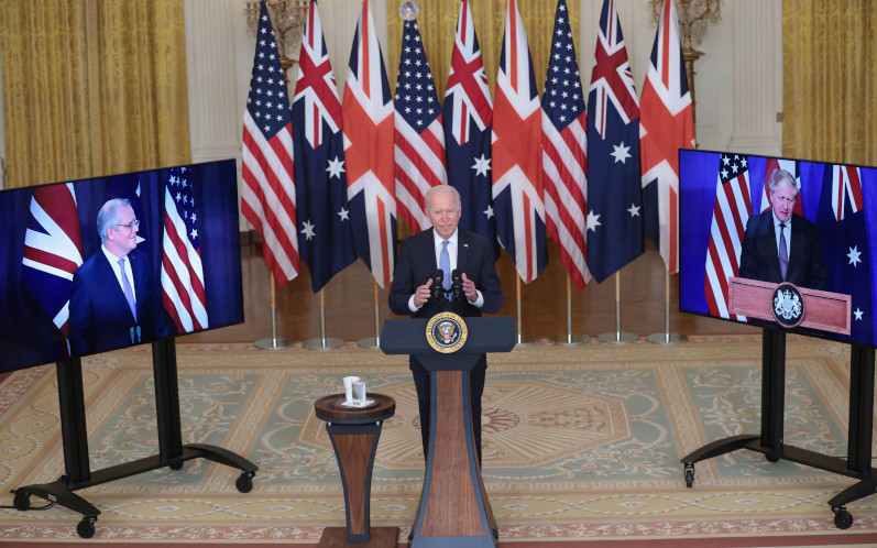 President Joe Biden, flanked by Prime Minister Scott Morrison of Australia, left, and Boris Johnson of the United Kingdom, right, delivers remarks about a national security initiative on September 15, 2021 in the East Room of the White House in Washington, DC. The leaders announced the creation of an enhanced trilateral security partnership called ?AUKUS? Australia, the United Kingdom, and the United States.Credit Oliver Contreras Pool via CNP MediaPunch Alamy image ID 2GM2HGN