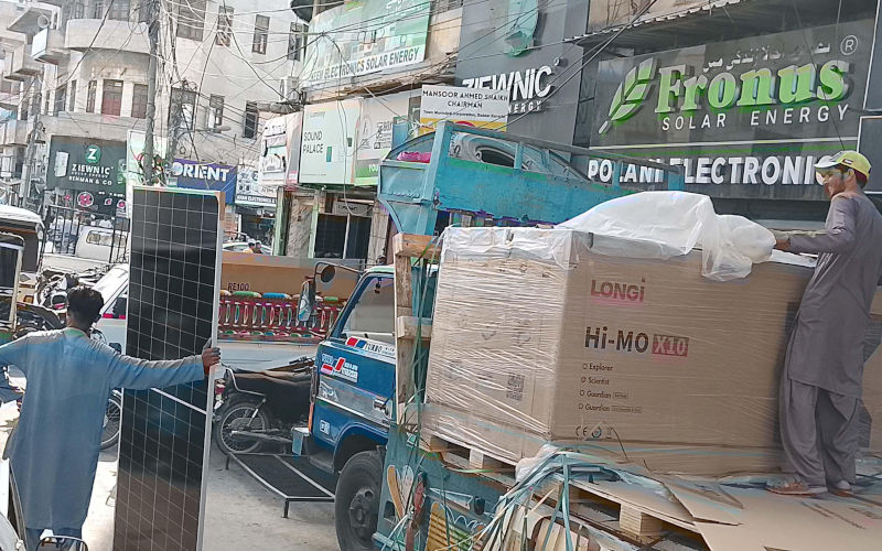 People busy in purchasing solar system for power generation as demand of solar system and UPS increased in city due to price hiking of electricity and prolong electricity loadshedding in city during summer season, at Saddar Regal Chowk Electronic Market in Karachi on Wednesday, May 13, 2026. As rising electricity bills push consumers toward solar energy, increasing global oil prices and import costs are also driving up solar panel rates across Pakistan. Image Pakistan Press International Almay Image ID 3EF5EJD