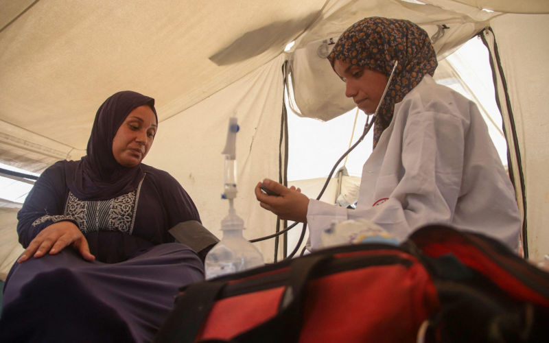 Aug, 2024. (INT) Jenin Abu Zarqa Providing Medical Help to Pregnant Women in Gaza. August 19, 2024, Gaza, Palestine A 22 years old Palestinian nurse Jenin Abu Zarqa, who graduated from the nursing school in 2023, opens a medical tent to examine pregnant women and treat patients in the war on Gaza. Image Hashem Zimmo TheNEWS2 via ZUMA Press Wire Alamy ID2XWG223