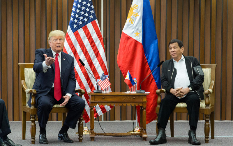 President Donald Trump and Philippine President Rodrigo Duterte, Nov. 13, 2017. Earlier Trump was reported to have congratulated him for doing an unbelievable job on the drug problem. Part of Dutertes solution was extrajudicial killing of suspects and addicts (BSLOC_2017_20_67) Image Everett Collection. Alamy Image ID KWD29F