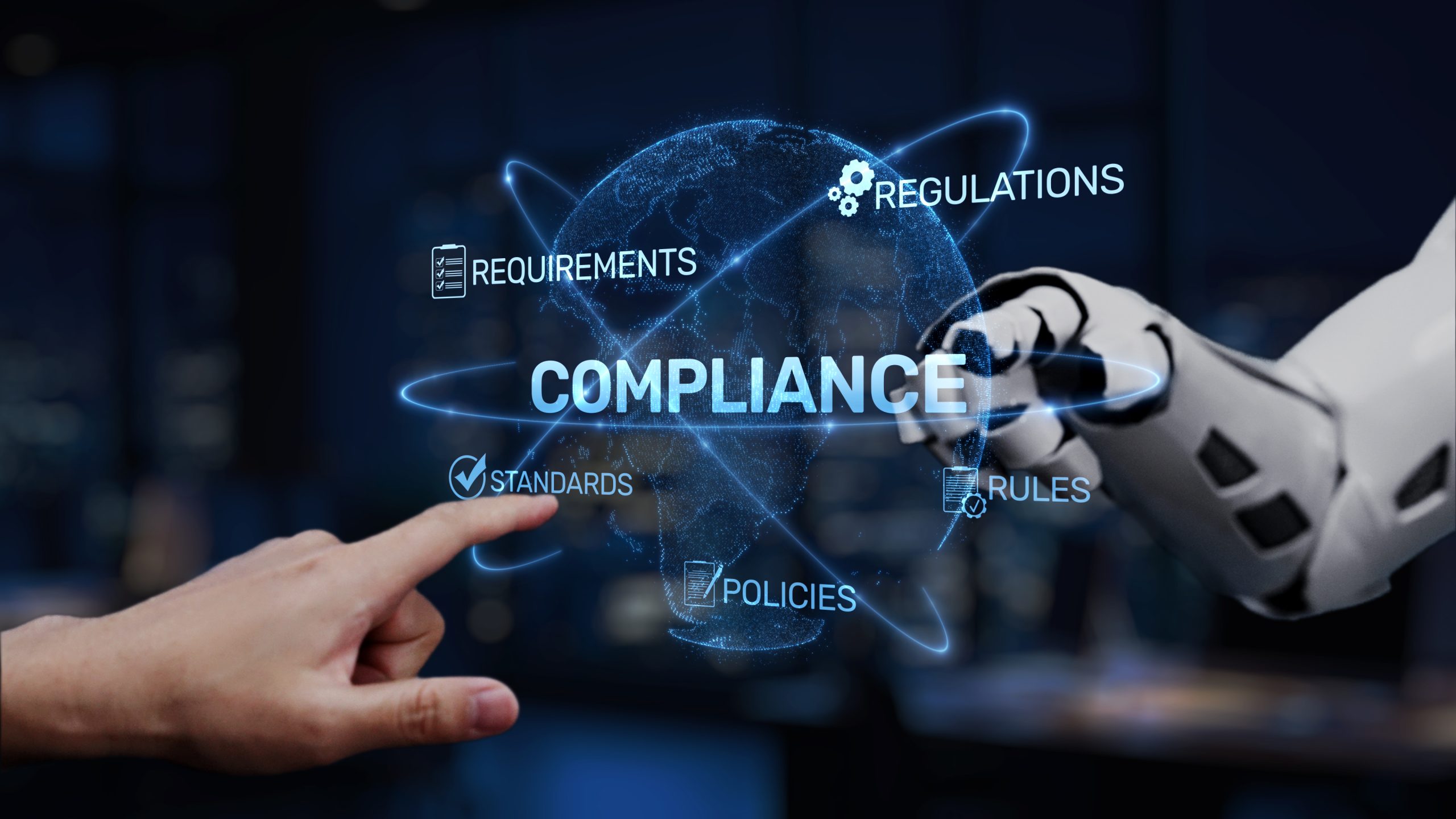 A human hand interacts with a robotic arm, illustrating the vital connection between technology and compliance in modern business practices AI. Image iStock Shinsei Motions